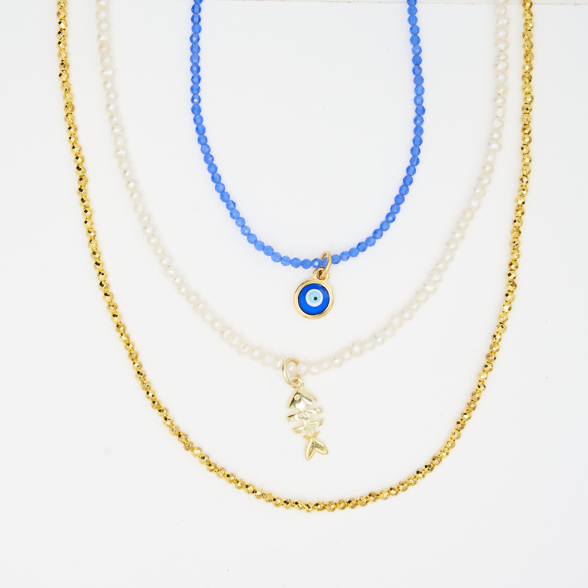 BLUE CRYSTAL EVIL EYE NECKLACE