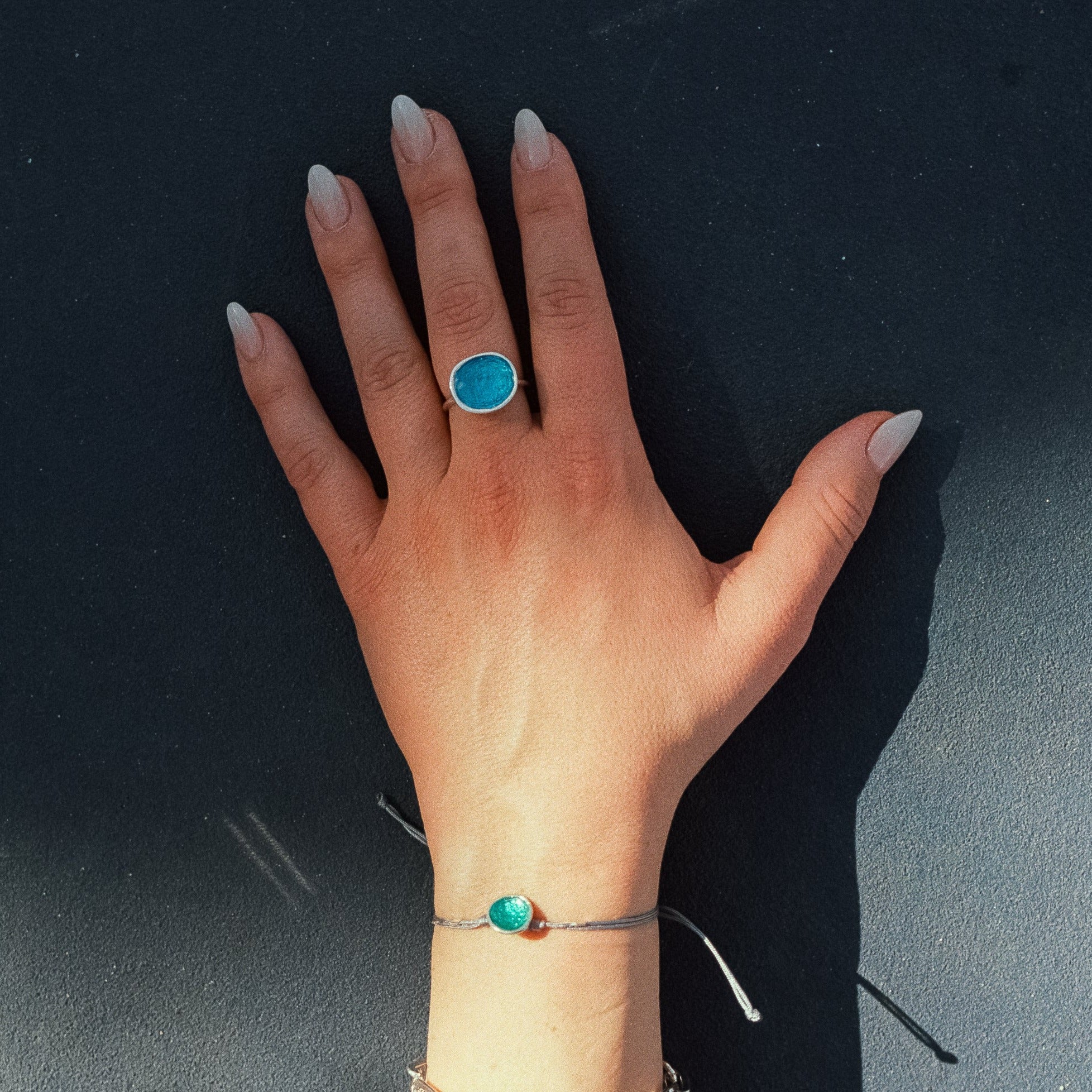 ADJUSTABLE DISC BRACELET