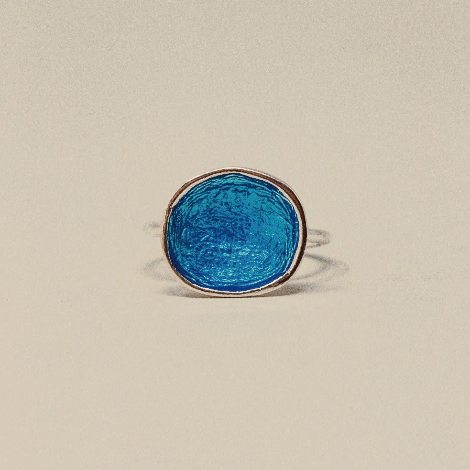 ADJUSTABLE DISC RING