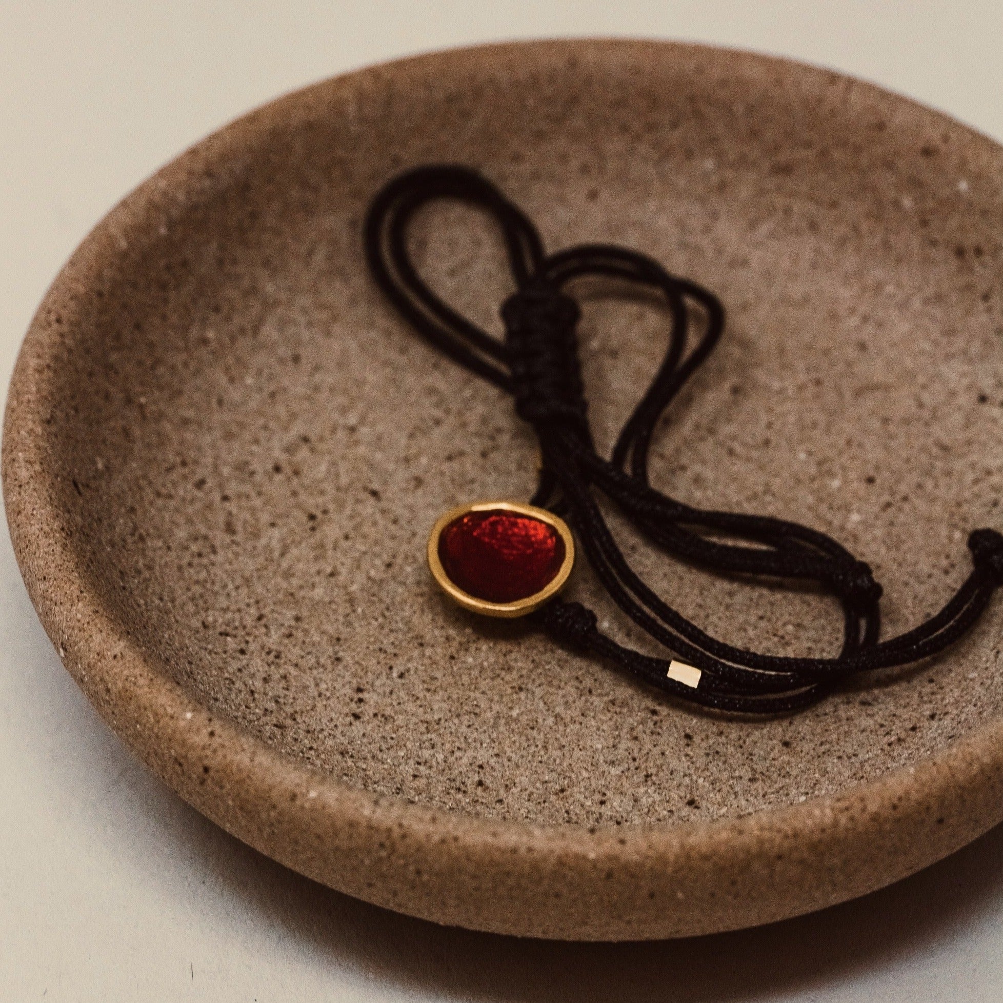 ADJUSTABLE DISC BRACELET